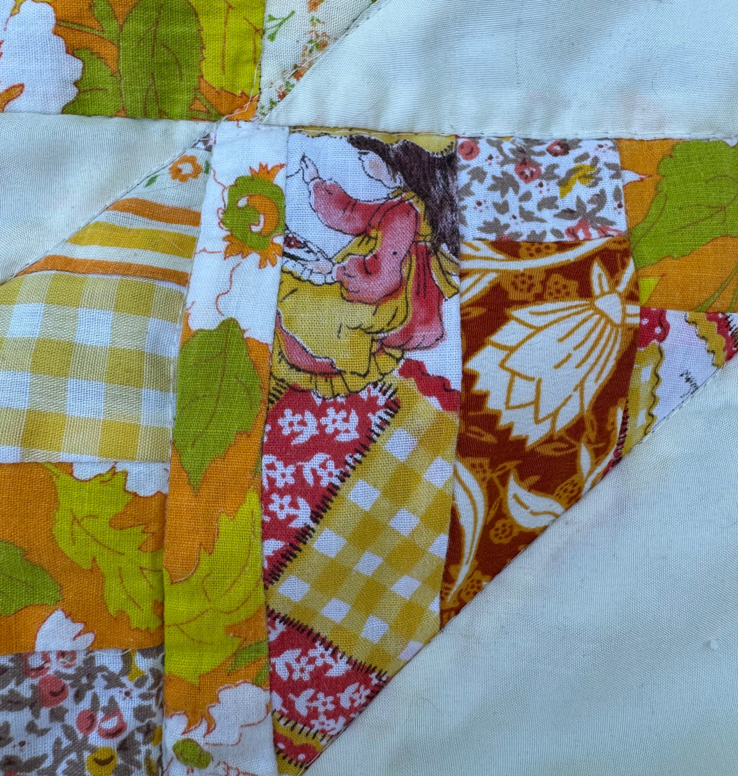 Daydream Quilt made from vintage fabric scraps from 1960's-1970's